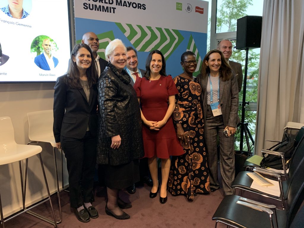 Her Honour with panelists at a migration talk at the World Mayor's Summit