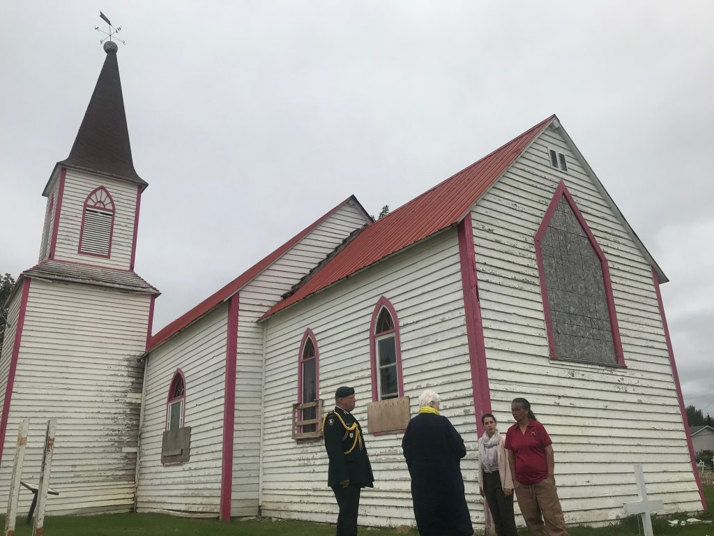 The Lieutenant Governor stands in front of St. Thomas’ Anglican Church